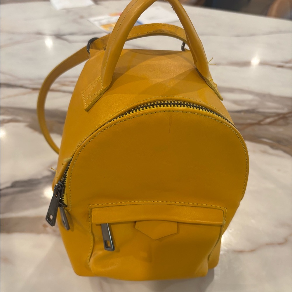 Leather mustard mini backpack